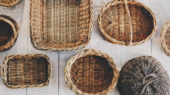 Variety of different sized wicker baskets.