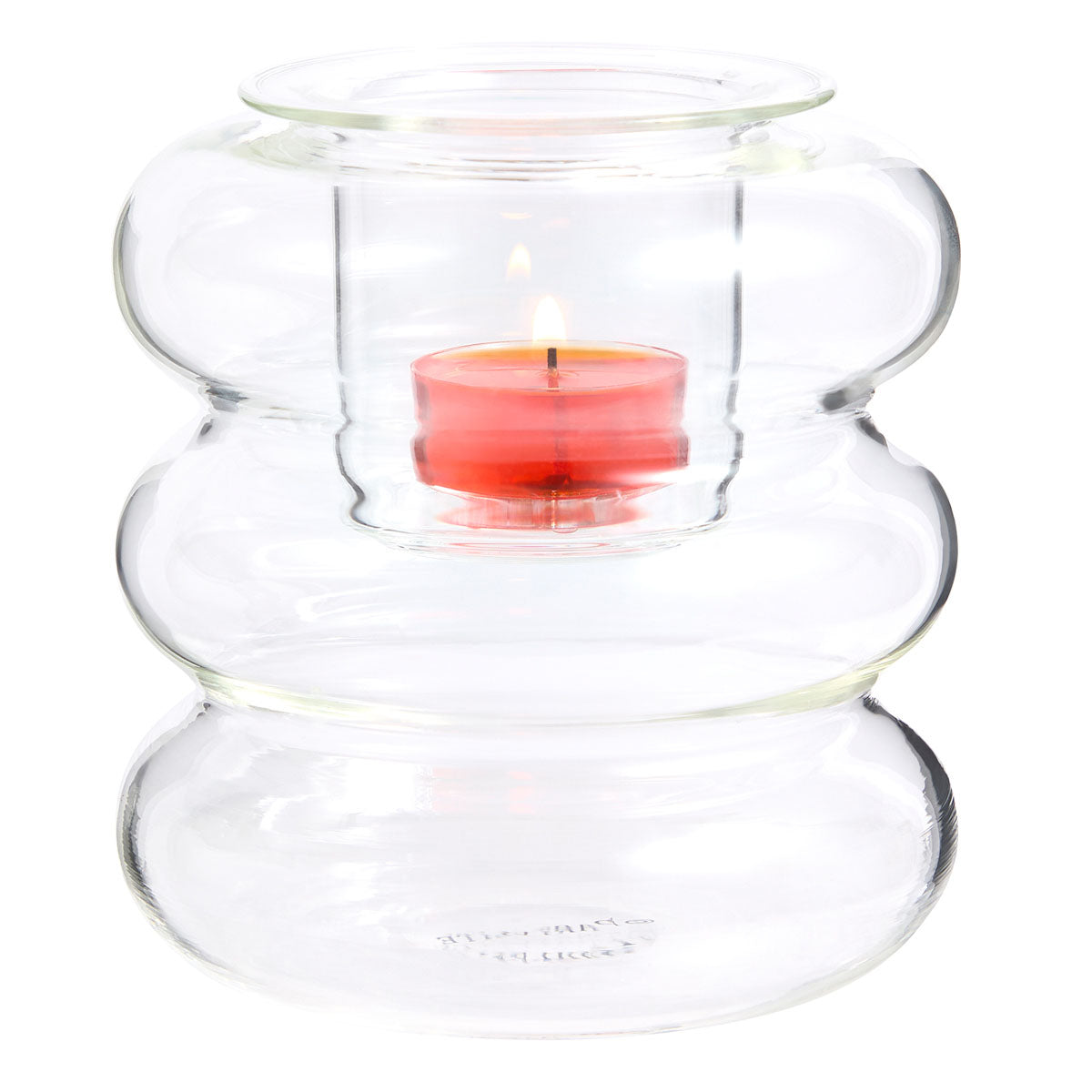 Illusion Tealight Holder shown with a lit tealight against a white background.