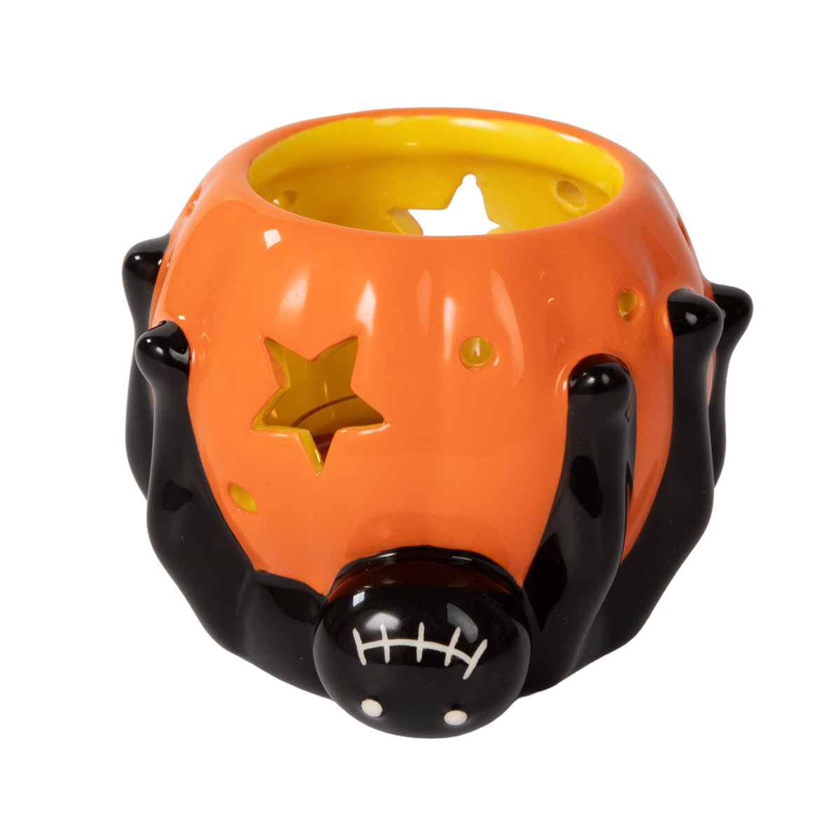 Silly Spider Candle Holder with a black spider smiling at the bottom of the holder and an orange candle holder against a white background.