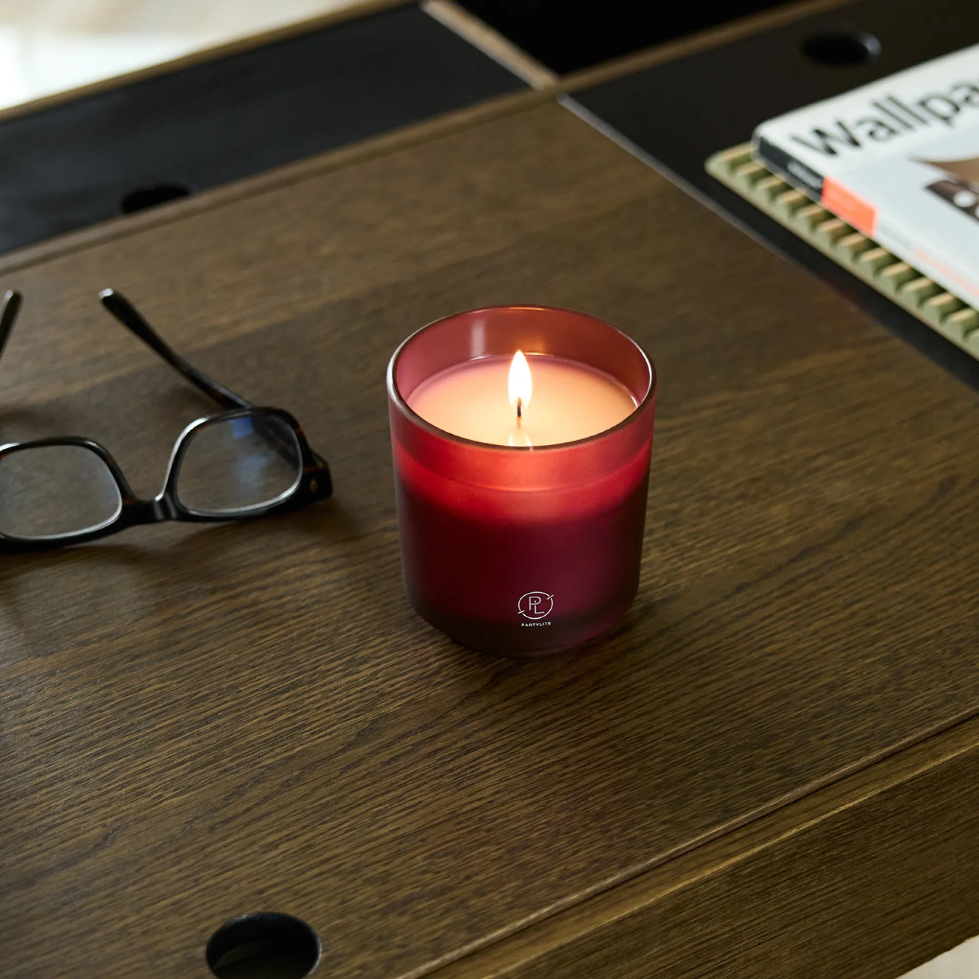 Mulberry Refillable Jar Candle shown on a wooden surface with a pair of glasses