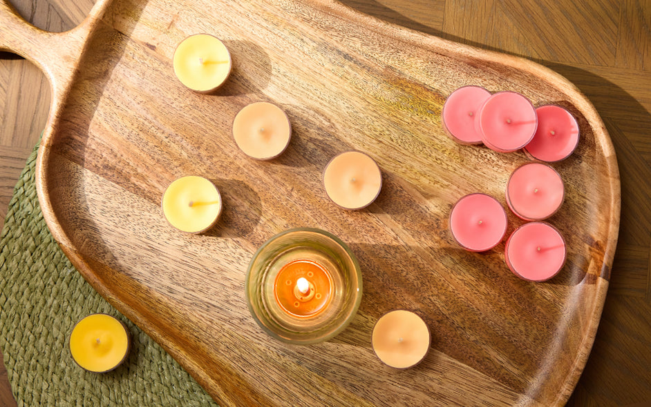 Assorted Tealights on a wooden tray