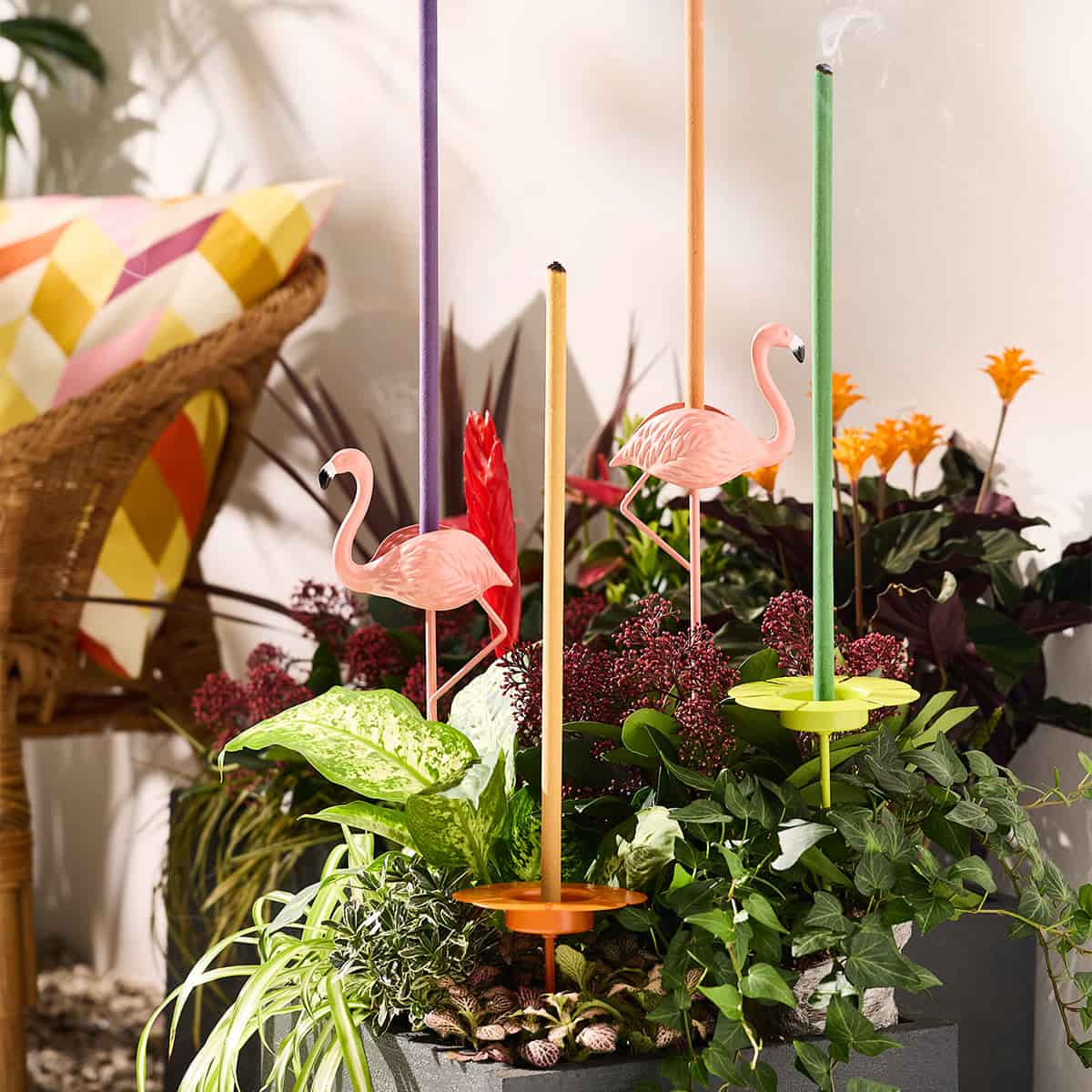 Flamingo Garden Incense Spike shown with citronella sticks in plant pots with a light background