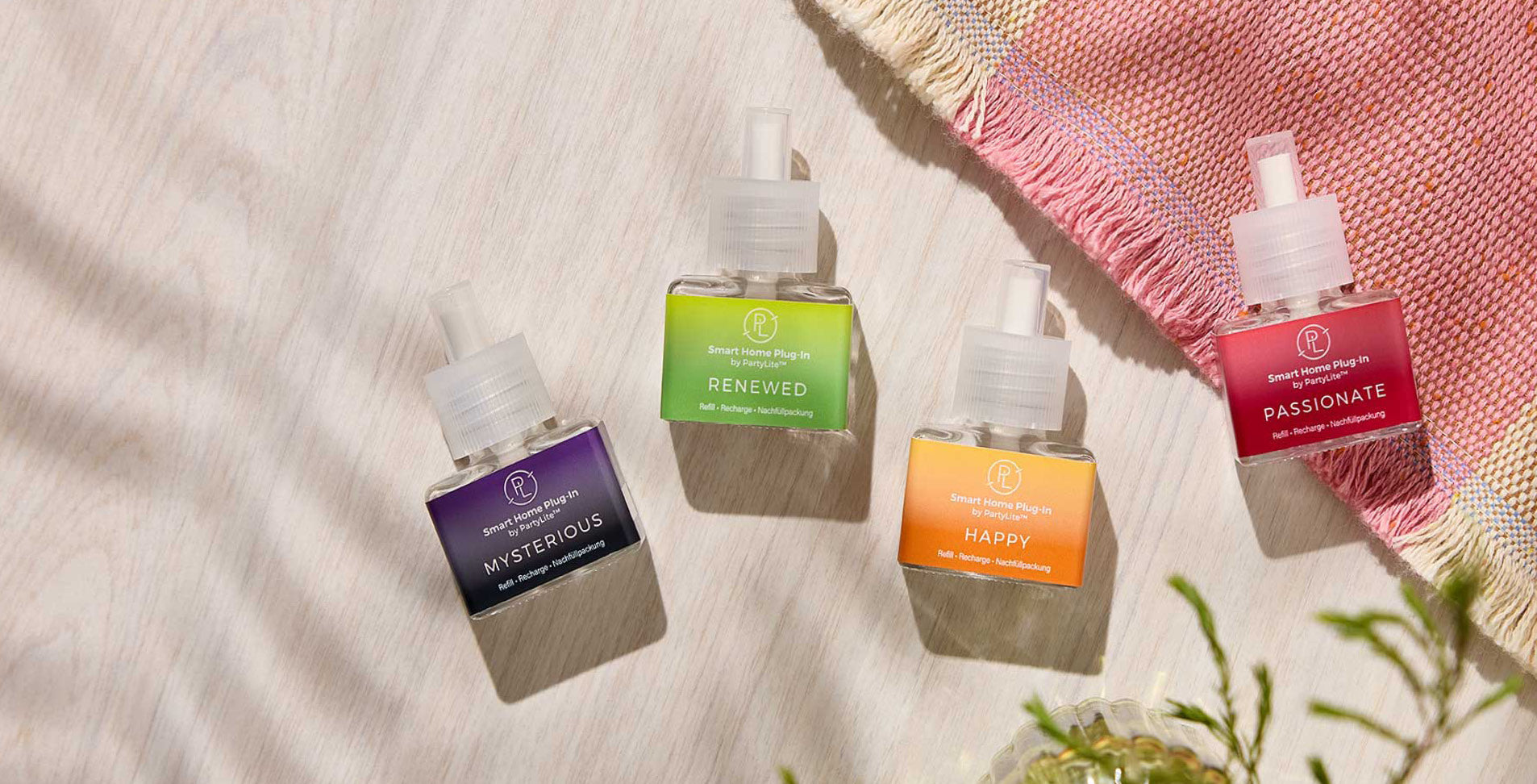 Smart Plugin Refills from Mood Collection on a light wooden surface.