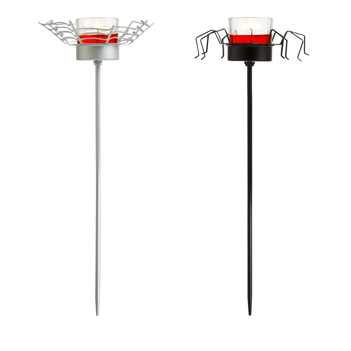 A pair of Halloween-themed garden incense spikes, one with a silver finish and a tealight candle on top, and the other with a black finish.