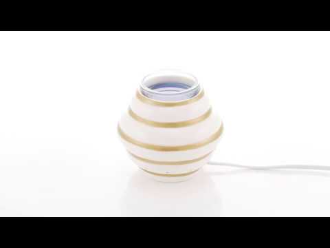 Queens Hive scentglow warmer against a white background.