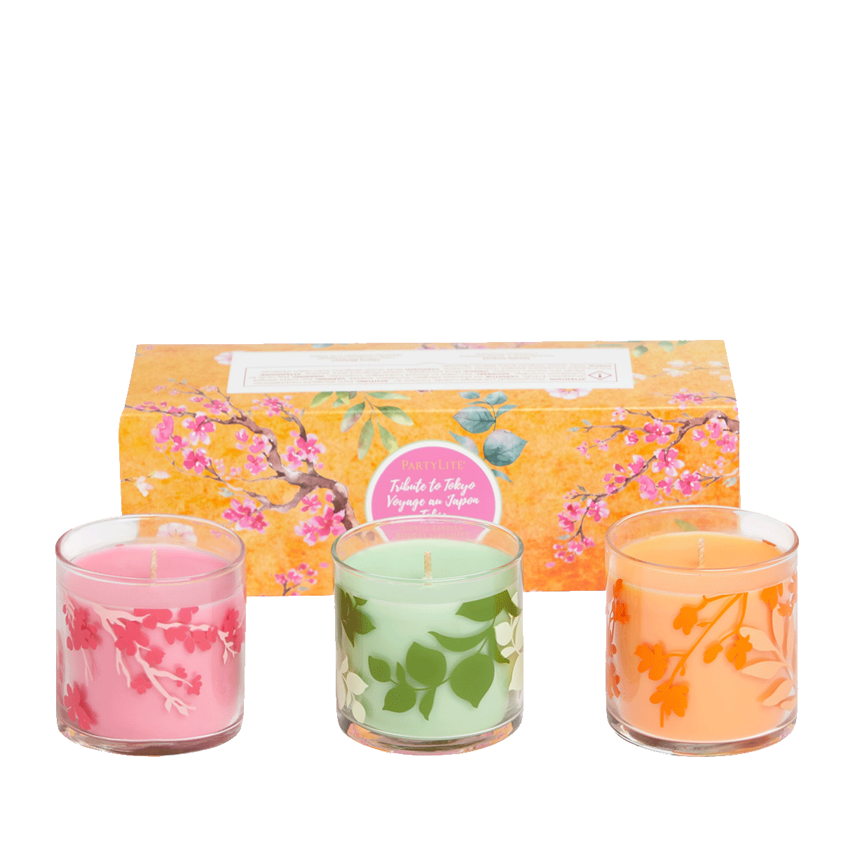 Tribute to Tokyo 3-Piece Jar Candle Sampler, with pink, green and orange colored wax.