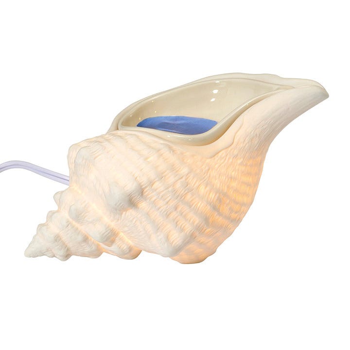 Conch Shell white scentglow warmer against a white background.