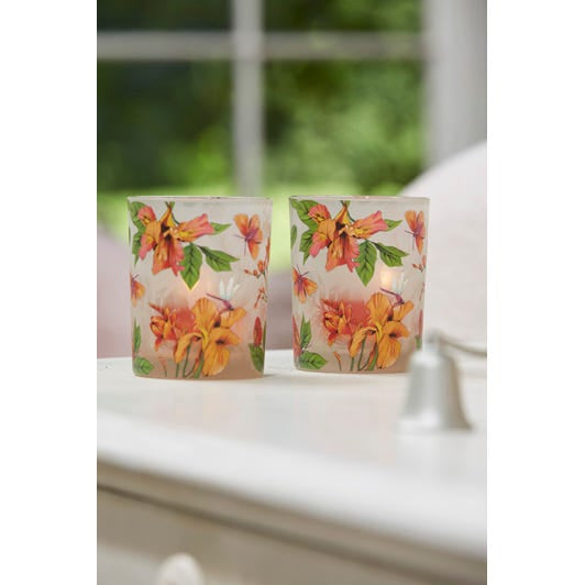 Afternoon Breeze Tealight Candle Holder Pair on a white surface, with a blurred window background.