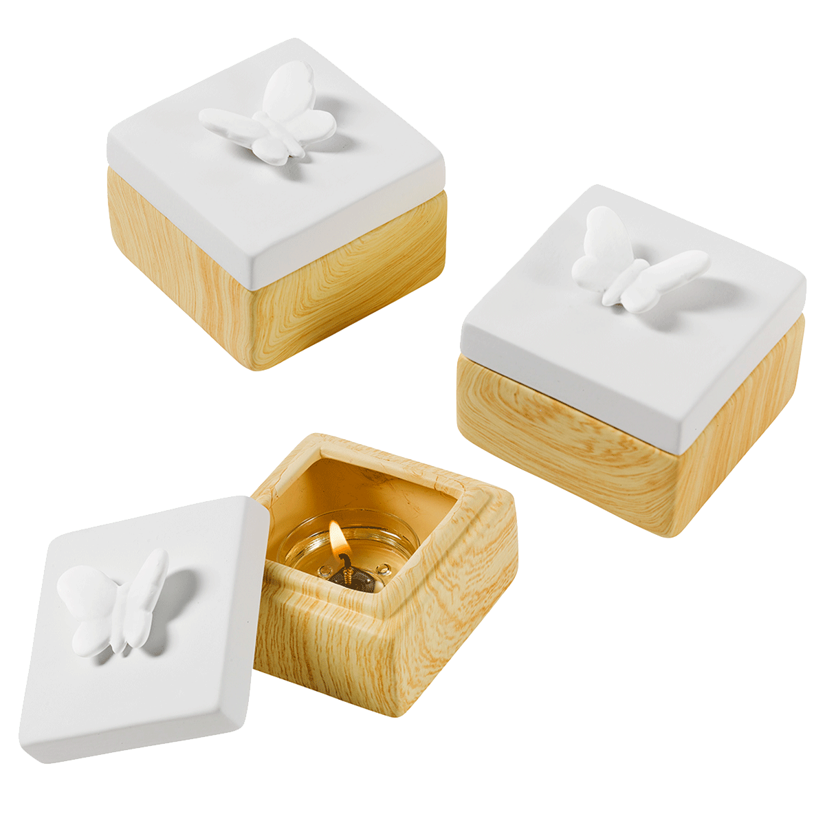 Spring Pals Tealight Candle Holder Trio wooden bases with white lids with either, a rabbit, butterfly and a bird against a plain background.