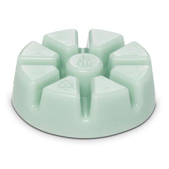 Honeydew wax melts in a mint green color against a white background.