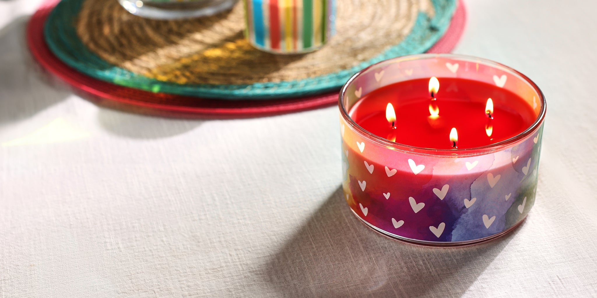 Lit Love is Love Sangria Sunset 4-Wick Specialty Jar Candle on a table