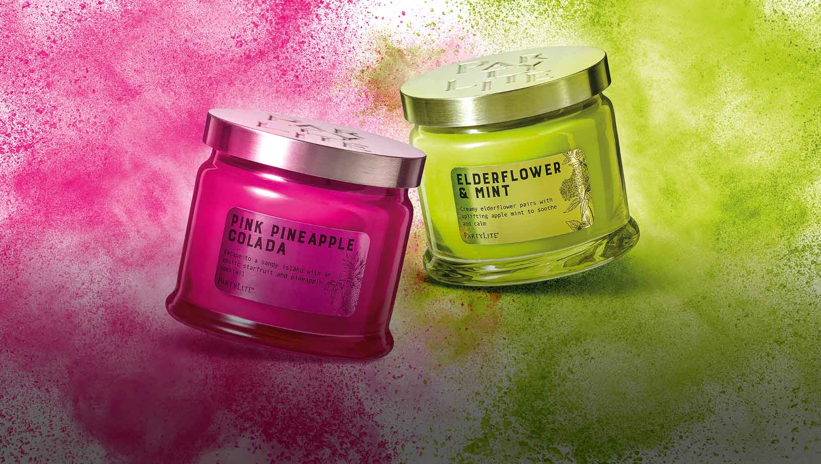 Two 3-wcik jar candles in Pink and Green against a pink and green background.