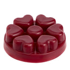 Bourbon Cherry heart shaped wax melts against a white background.