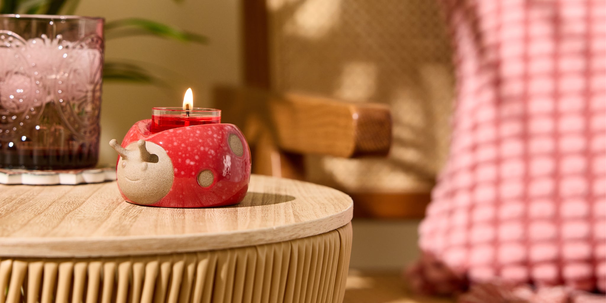 Loveable Ladybug Tealight Holder on a table