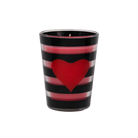 Candle in a black and red striped container with a red heart design on a white background