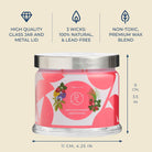 Candle jar with pink label and measurements on a beige background