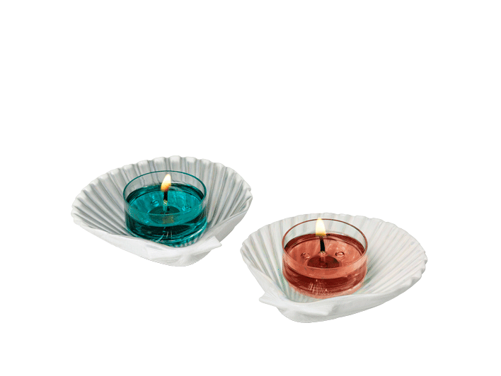 Seashell Tealight Candle Holder Pair shown with lit tealights.