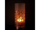 Frosted Honeycomb Hurricane with rose gold colored metal hexagon shapes with a white frosted insert, shown with a lit candle against a dark background.