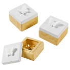 Spring Pals Tealight Candle Holder Trio wooden bases with white lids with either, a rabbit, butterfly and a bird against a plain background.