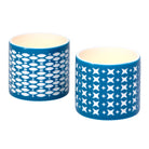 Grecian Tealight Candle Holder Pair blue color with patterns on against a white background.